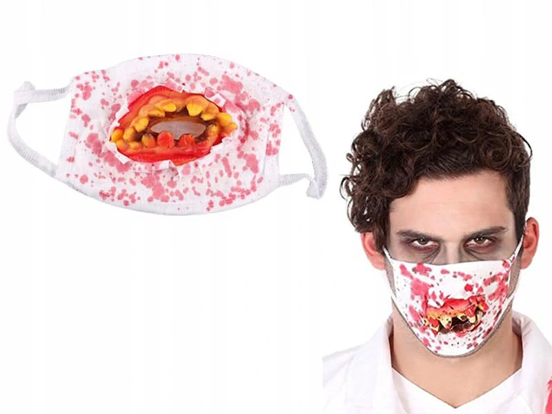 Halloweenska strašidelná maska zakrvavená so zubami