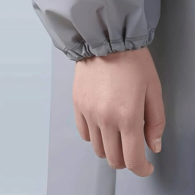 Pršiplášť na zapínanie pre dospelých sivý